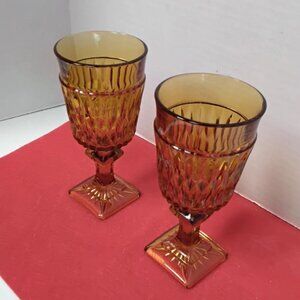 Vintage Indiana Glass Mt Vernon Amber Goblets with a diamond point pattern and a